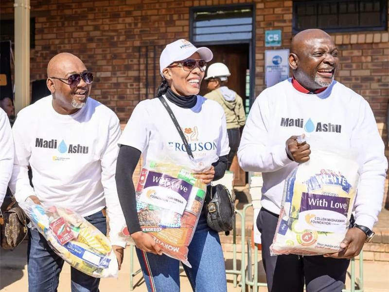 Cecil Mashawana, Connie Ferguson and Collen Mashawana ready to hand out the packages.