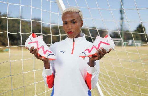 Nomvula Kgoale displays her athletic footwear.