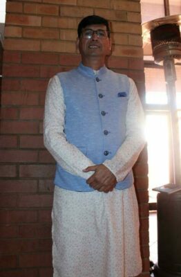 The calm and collected MC, Hemraj Sharma, did a great job at introducing all the speakers and singers. Photo by: Lebogang Tlou