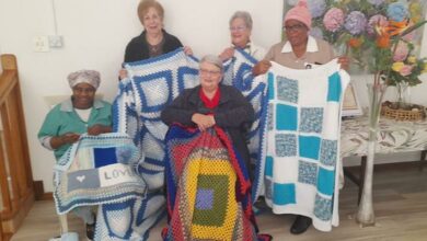 Ruth Ndlovu, Sandra Shalekoff, Melody Needham, Christina Modia, and Sandy White have knitted 27 blankets for Mandela Day.