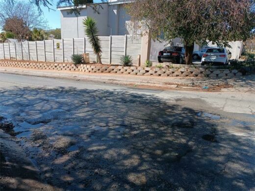 Parkmore suburbs community manager Lori Klein supplies pictures detailing the severity of the potholes on 13th Street and Olympia Avenue.