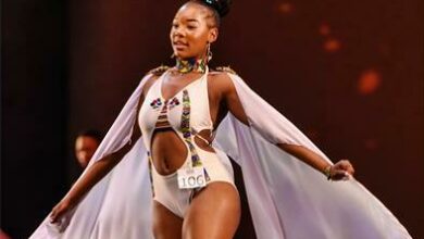 Enhle Mdakane shows off her swimwear on stage.