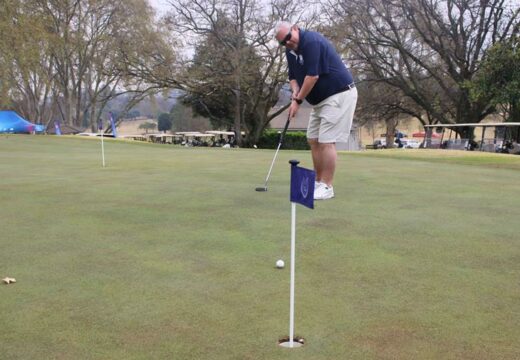Bryanston Primary School principal Morné Marx practises his putting before teeing off for a fun day of raising funds. Photo: Lebogang Tlou