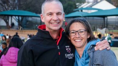 Ryan and Cathy Haigh smile for the camera.