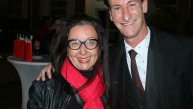 Mandy Roff with the magician Wolflock following his mind-blowing magic routine. Photo: Lebogang Tlou