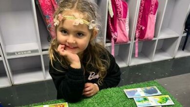 Sienna Ronco smiles after matching all her drawings.