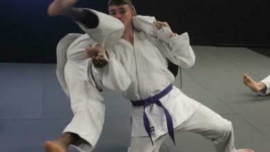 Judoka Matthew Hunt (purple belt) and Neo Mogase-Williams (first-Dan black belt) practise the Kata Garuma takedown technique taught to them by Sensei Basil Williams on September 6.