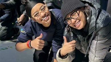 Graciebelle Makhane and Danika Parker, the second-year students in the IIE Bachelor of Social Sciences leave their handprints on the My Varsity Memory Wall.