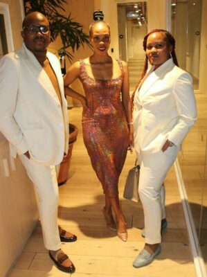 On their way to Milan are brand owners and fashion designer couple, Pat and Rethabile Mokgatle (dressed in white), with Keke Moeca (center). Photo: Lebogang Tlou