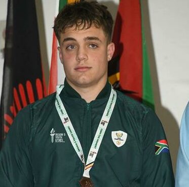 Battling older opponents and a knee injury, the young South African judoka Maxx Mackenzie clinched bronze at the Region 5 Youth Games.