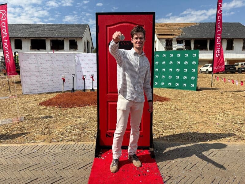 A seemingly simple coat of red paint that turned an ordinary wall in Bryanston into the talk of the town has finally come to an end.