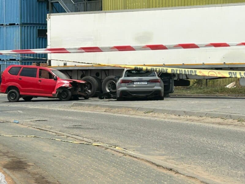 A red minibus taxi and an Audi are two of the multiple vehicles damaged in the shooting on October 30, 2025. Photo: Itumeleng Maloka