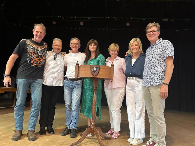 Two alumni groups returned to their old school, trading decades of distance for a night of stories, laughter, and the comfort of familiar faces.