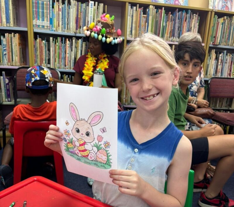 A vibrant colouring party, as children and families gathered at the library to celebrate reading, creativity, and the joy of learning during the school holidays.