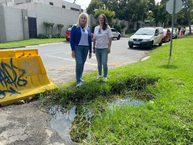 Johannesburg Roads Agency and Johannesburg Water met on site to determine the cause of the ongoing water flow and sinkholes, with residents demanding swift action after years of inaction.