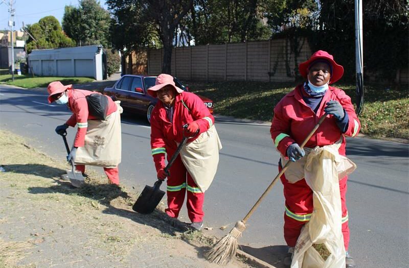 Volunteers commemorated Youth Day by clearing overgrown vegetation on a neglected stretch of Corlett Drive that residents say had become a haven for criminal activity.