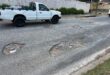 Motorists navigate multiple potholes along a damaged section of 1st Avenue in Kew in May 2026. Photo: Duduzile Khumalo