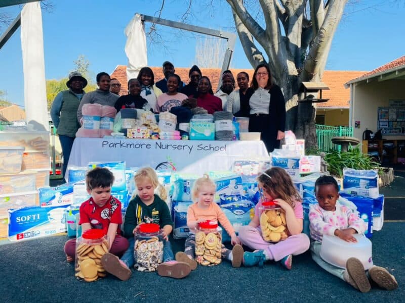 Parkmore Nursery School learners embraced the spirit of giving by helping collect donations for elderly residents and preparing sandwiches for those in need.