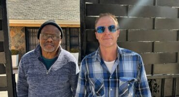 Sam Tau and Andrew Stewart speak about the power issue in Bramley North July 21, 2026. Photo: Duduzile Khumalo