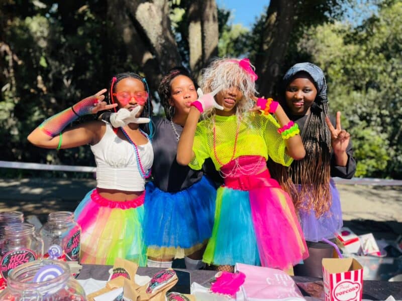 Nonjabulo Shoba, Ella-Rose van Rooyen, Aphiwe Buthelezi, and Simosihle Mokwena rock colourful outfits while promoting their business during Brescia House School's August Rush Market Day on August 4, 2026. Photo: Xoliswa Zakwe