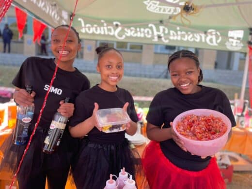 Simosihle Nkainde, Sisipho Ndaba, and Kezi Matenji showcase the delicious treats available at their stall at Brescia House School's August Rush Market Day on August 4, 2026. Photo: Xoliswa Zakwe
