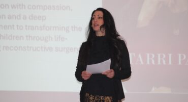 Smile Foundation CEO Tarri Parfitt welcomes the guests to the event on August 8, 2026. Photo: Duduzile Khumalo