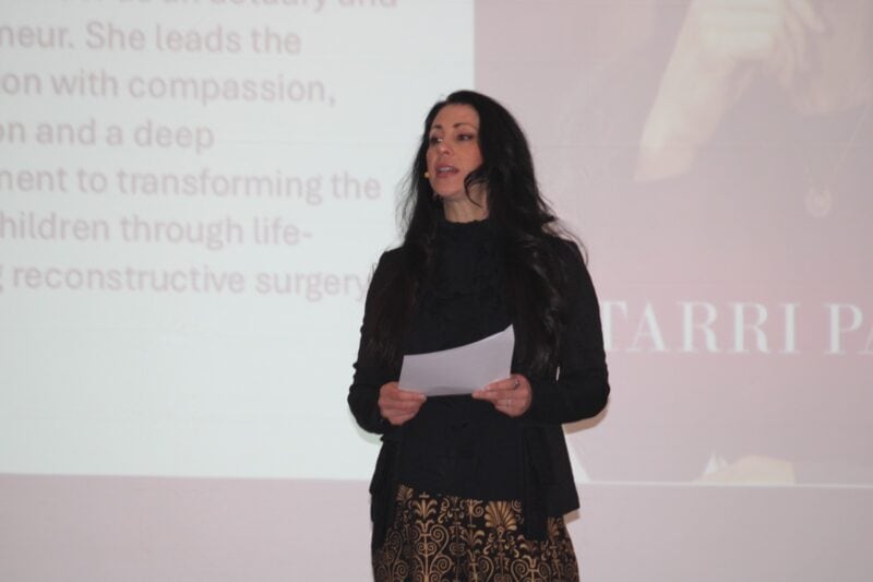Smile Foundation CEO Tarri Parfitt welcomes the guests to the event on August 8, 2026. Photo: Duduzile Khumalo
