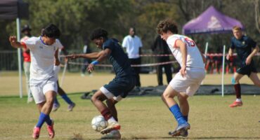 St Benedict’s Nathan Ross and Cristiano Correia with St John’s Kwandi Ngcobo battle for possession in the U19 finals of the St Davids Challenge Cup on August 9, 2026. Photo: Xoliswa Zakwe
