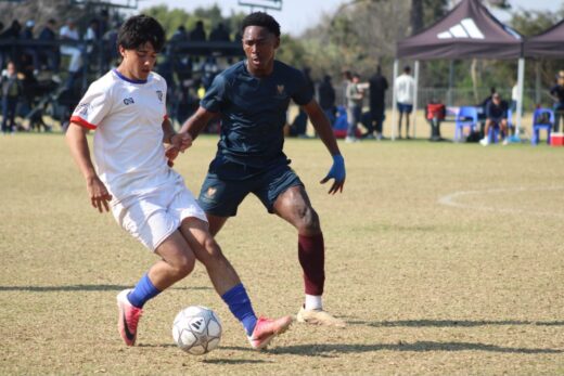 St Benedict’s Nathan Ross passes the ball as St John’s Kwandi Ngcobo attempts to tackle during the U19 finals of the St Davids Challenge Cup on August 9, 2026. Photo: Xoliswa Zakwe