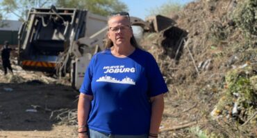 Ward 103 councillor Lynda Shackleford stands among piles of garden refuse at the Pikitup Ballyclare site in Bryanston on August 25, 2026.