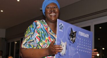 Lizzy Nkuna takes to the red carpet with the February 2027 page of the Sandton SPCA’s 2027 calendar featuring Leo and Tau during the launch at Bryanston Country Club on August 27, 2026.