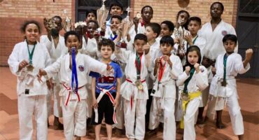 Members of the Marlboro Shotokan Karate Club proudly display their medals and trophies after delivering strong performances at the 5th Gold Karate Tournament. Photo: Xoliswa Zakwe