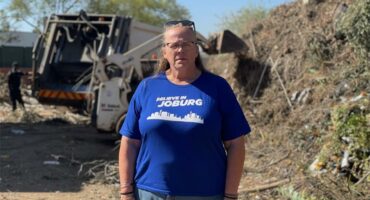 Ward 103 councillor Lynda Shackleford stands among piles of garden refuse at the Pikitup Ballyclare site in Bryanston on August 25, 2026. Photo: Xoliswa Zakwe