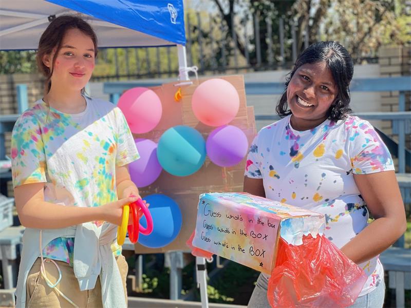 Caylin Deyzel and Alexia Kondiah showcase their Aim It to Win It Ring Toss Challenge, offering learners an interactive game with prizes as part of their business venture during the school’s entrepreneurship day on August 28, 2026.