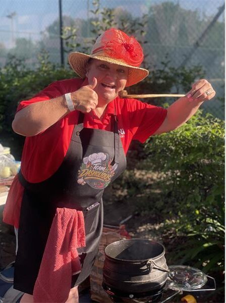 Jennifer Howard tastes her secret ingredients at the BNI potjiekos competition held at Bryanston Sports Club on September 12, 2026. Photo: Xoliswa Zakwe