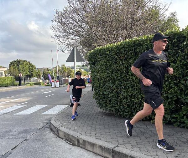 Christie Marsh and Nolan Marsh run to the finish line on September 20, 2026. Photo: Duduzile Khumalo