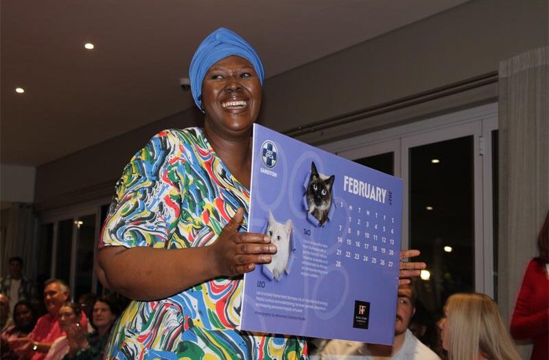 Lizzy Nkuna takes to the red carpet with the February 2027 page of the Sandton SPCA’s 2027 calendar featuring Leo and Tau during the launch at Bryanston Country Club on August 27, 2026.