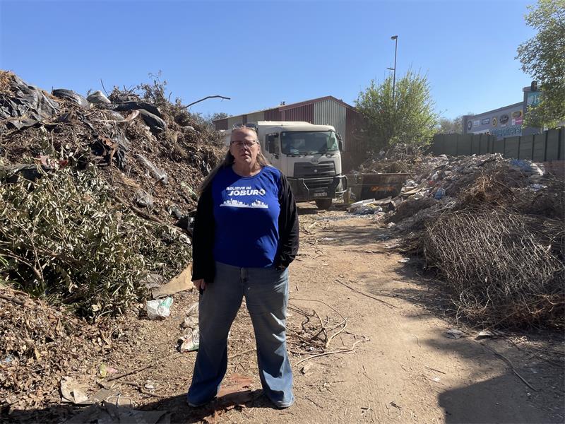 Ward 103 councillor Lynda Shackleford stands among piles of garden refuse at the Pikitup Ballyclare site in Bryanston on August 25, 2026. Photo: Xoliswa Zakwe