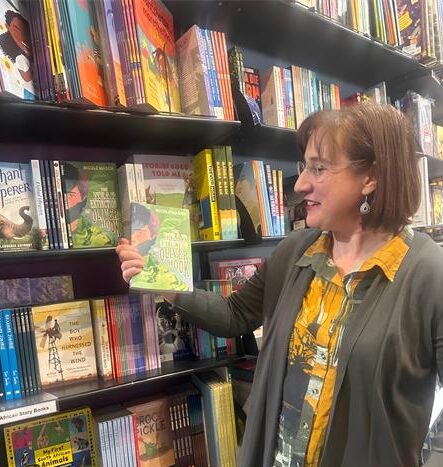 Nicole Mason holds her debut children’s book; The Near Extinction of Oliver Hook at Exclusive Books in Sandton City. Photo: Supplied