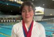 Drew poses poolside wearing the medals he won at the Eastern Gauteng Aquatics Senior Winter Championships on 22 and 23 August 2026. Photo: Supplied