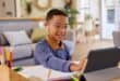 a boy with a laptop