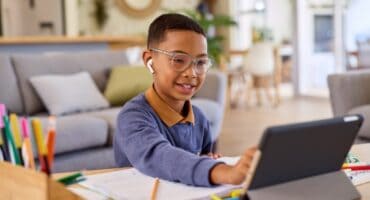 a boy with a laptop