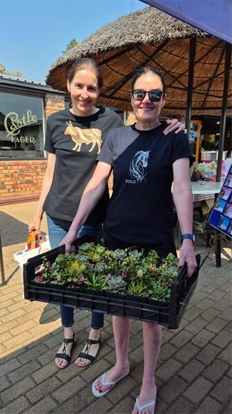 Bronwyn and Heather Allan made a substantial donation to the Sandton SPCA on market day and receive a tray of succulents on September 26, 2026. Photo: Supplied