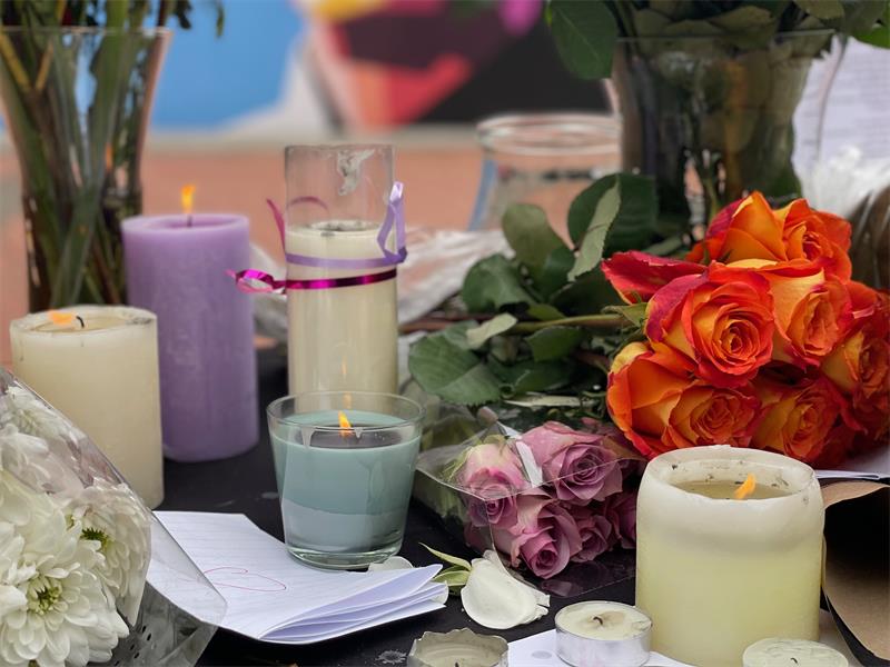 Candles and flowers are placed together at Crawford International Sandton College as learners and staff honour women who have lost their lives to gender-based violence on September 18, 2026.