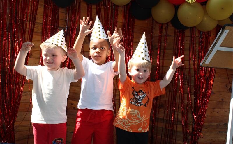 De-wet Botha, Thabo Phakisa and Cayden Van Greunen celebrate the school’s 10th birthday wearing party hats as they enjoy the day’s activities and entertainment on September 11, 2026.