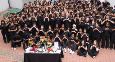 Learners and staff at Crawford International Sandton College gather in black as they stand in solidarity against gender-based violence and honour women who have lost their lives on September 18, 2026.