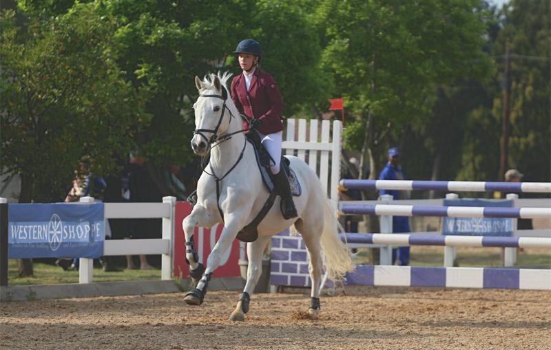After finishing second last year, Katie Cochran and Luigi returned to the Sanesa National Championships to claim the open equitation title, with podium finishes in the 1.20m showjumping classes adding to her success.