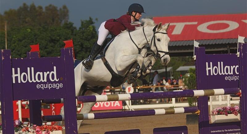 Description: Katie Cochran and Luigi claim the open equation title and a podium finish in the 1.20m showjumping classes. Photo: Supplied
