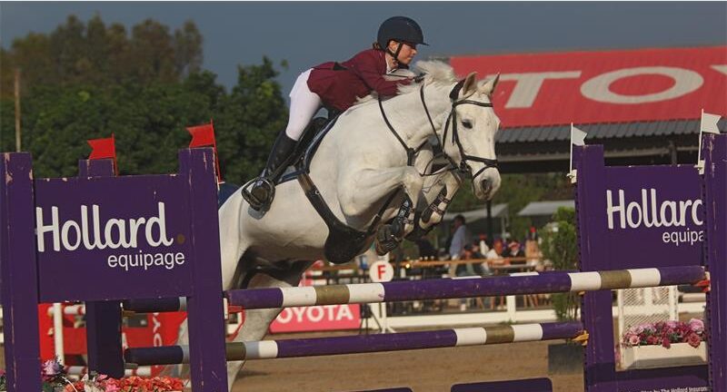 Description: Katie Cochran and Luigi claim the open equation title and a podium finish in the 1.20m showjumping classes. Photo: Supplied