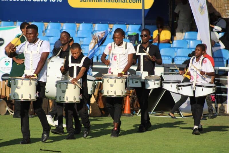 Young performers from across the country take to the field with music, energetic routines, and colorful costumes as the 29th national championships near their climax.